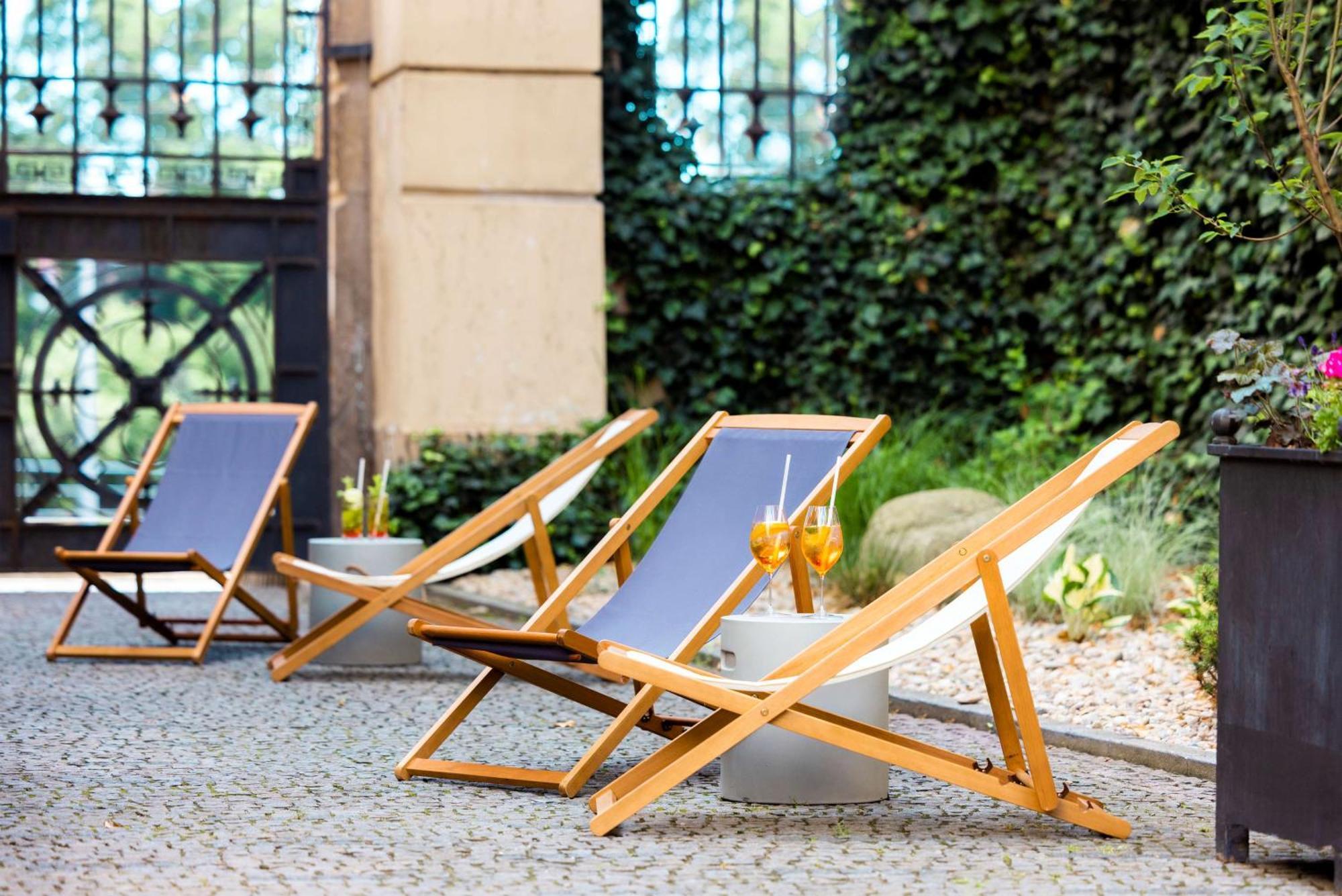 Nh Collection Prague Carlo IV Hotel Exterior photo A pair of deck chairs